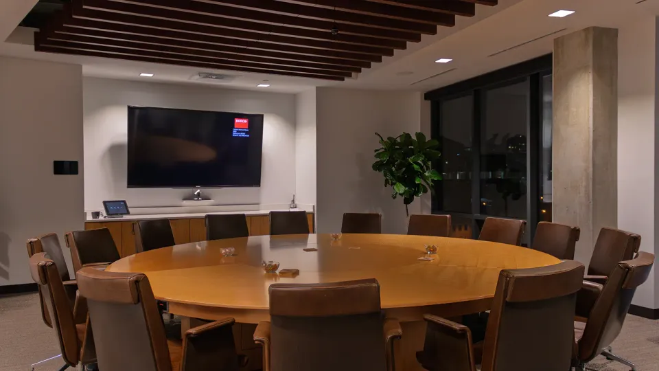 A conference room equipped with integrated AV by IKBSystems.